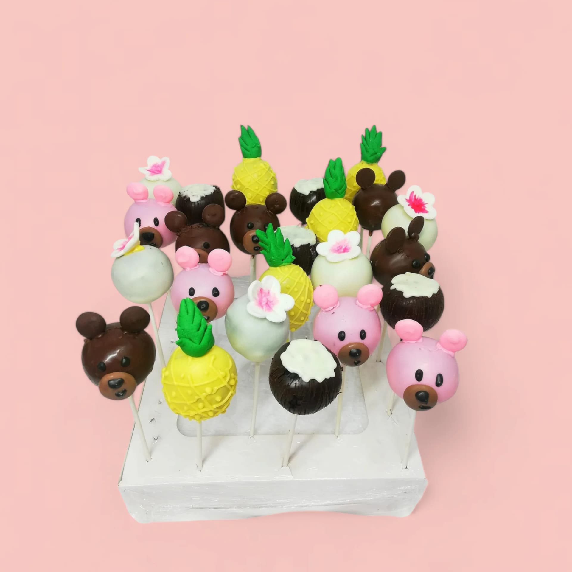 Hawaiian with Pink and Brown Bears-Themed Cake Pops by Love Bites Cake Hub