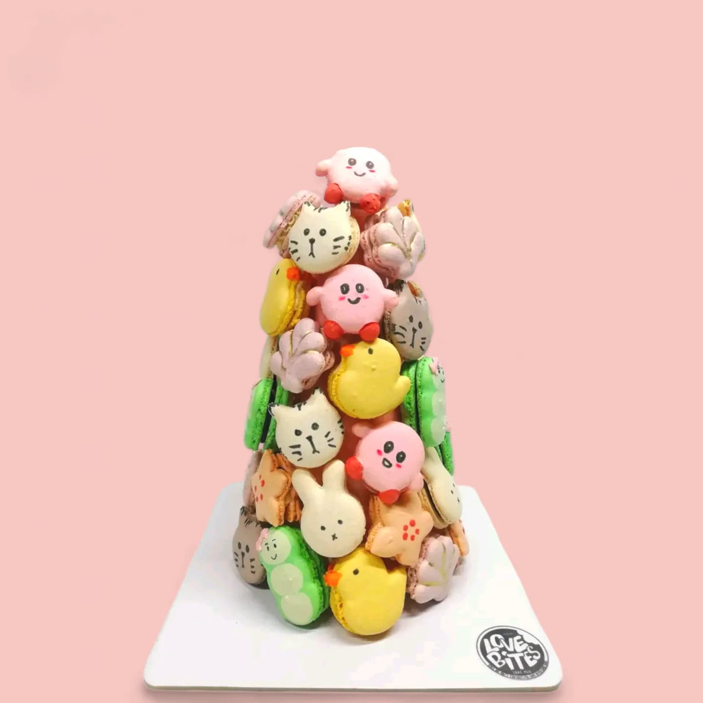 Custom Macaron Tower by Love Bites Cake Hub