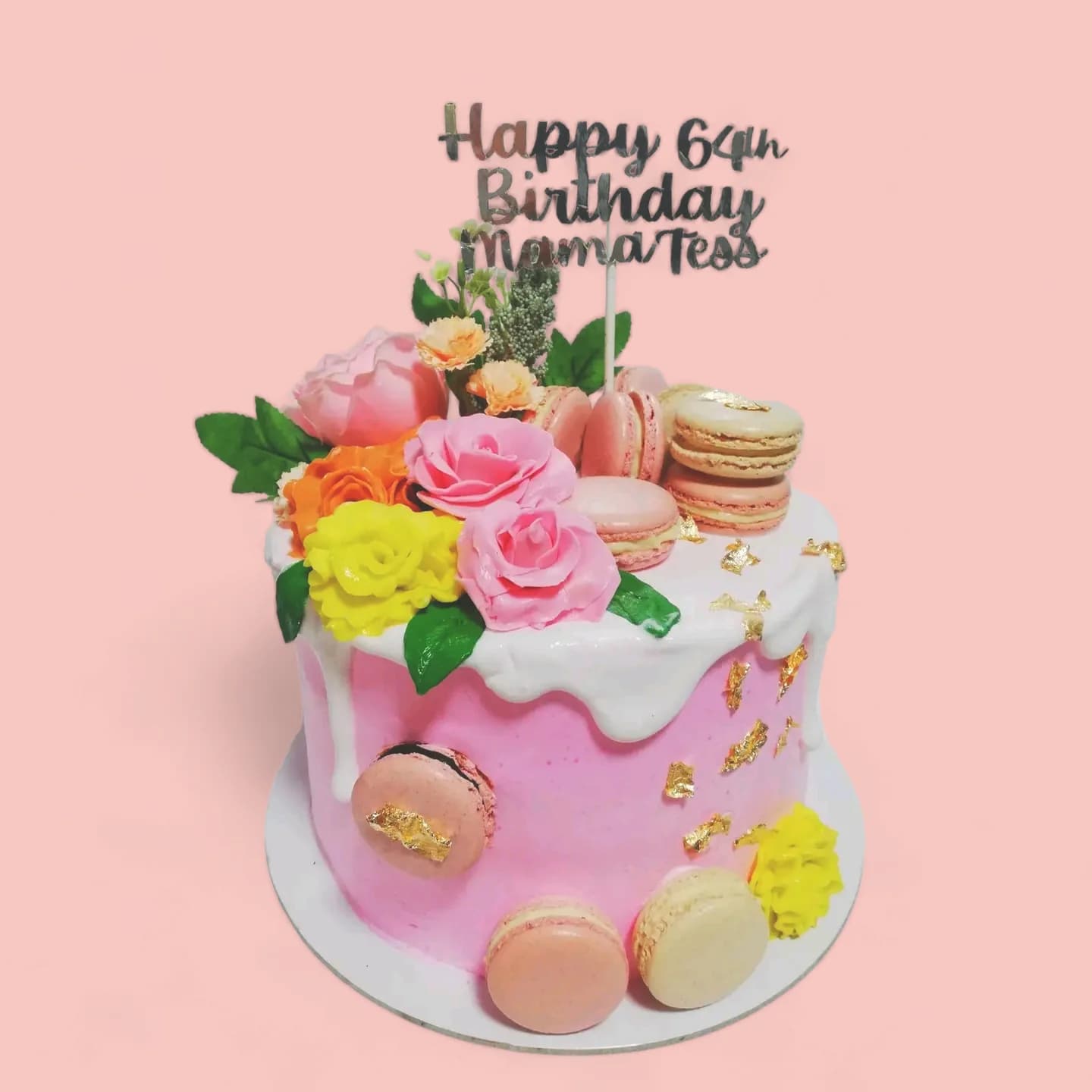 Custom Flowers and Macaron-Themed Birthday Cake with Fondant Details by Love Bites Cake Hub