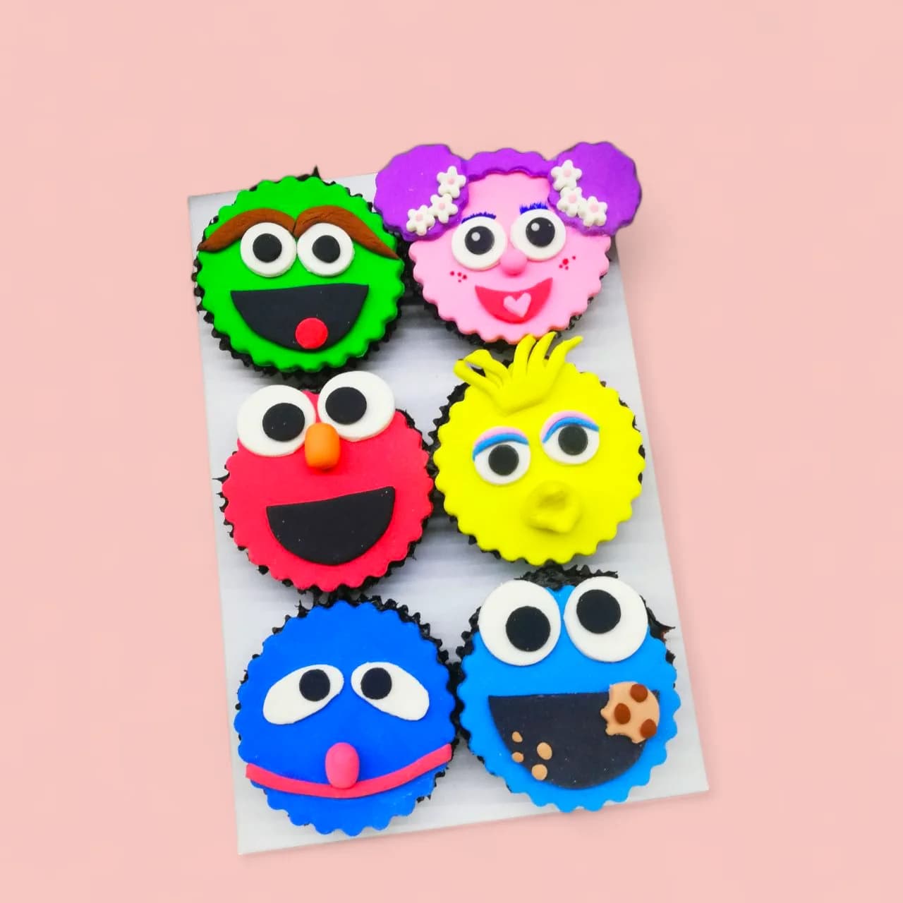 Sesame Street-Themed Fondant-Detailed Cupcakes by Love Bites Cake Hub