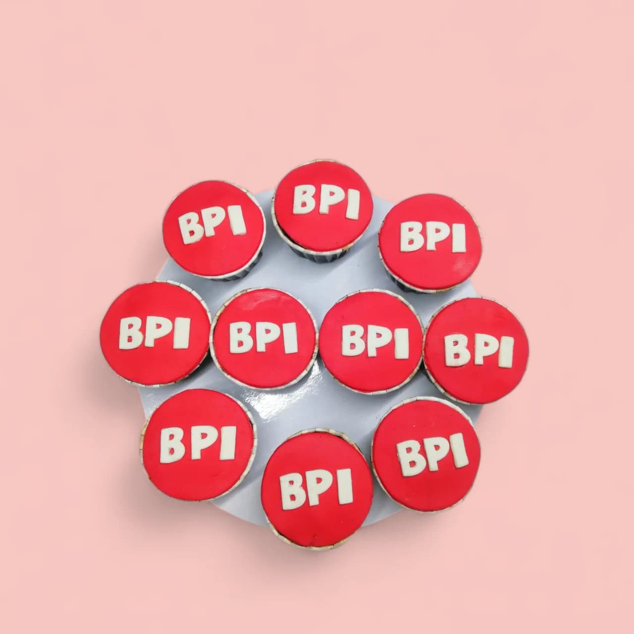 BPI-Themed Fondant-Detailed Cupcakes by Love Bites Cake Hub