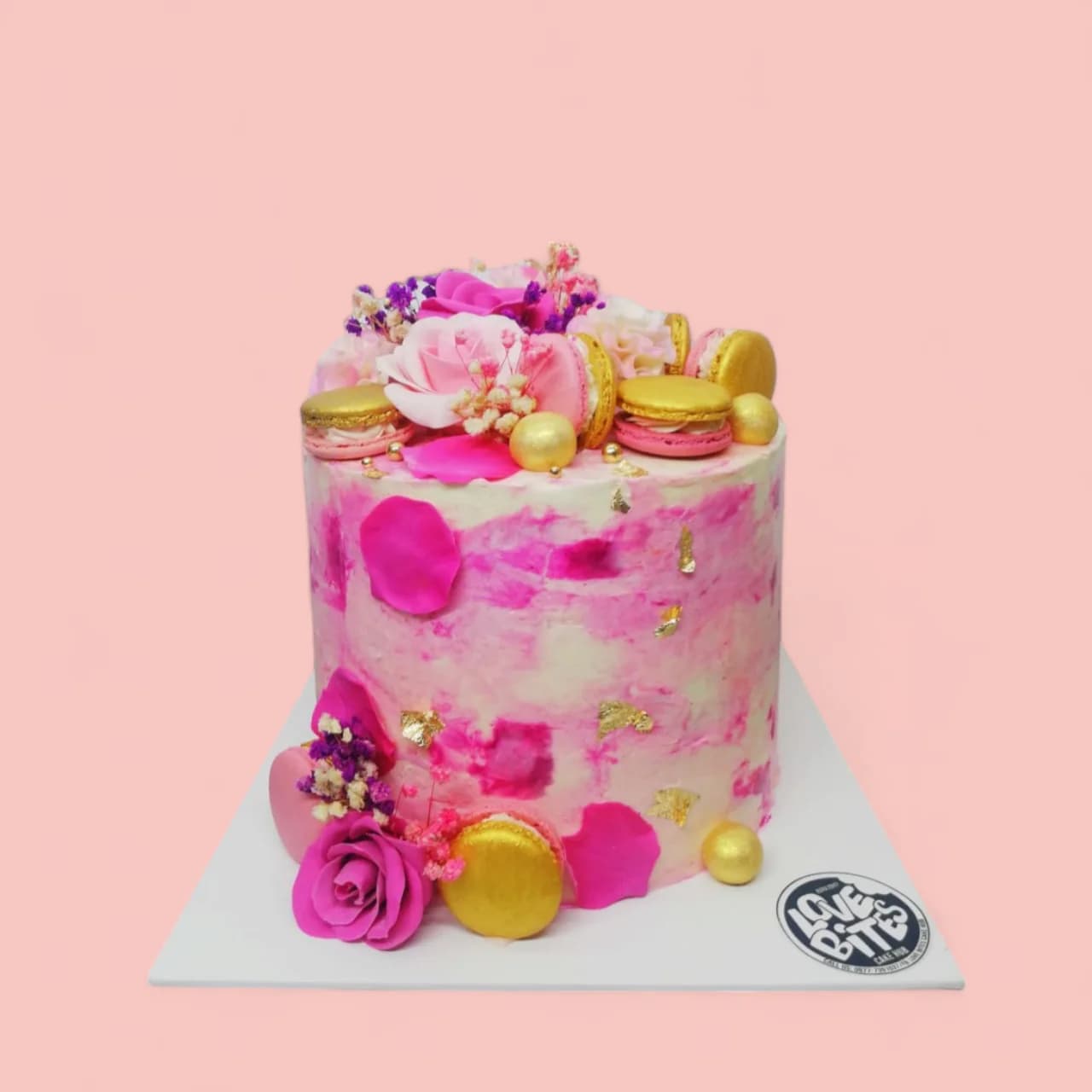 Custom Pink with Pink and Gold Macaron-Themed Birthday Cake by Love Bites Cake Hub